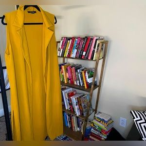 A cute barely warn sleeveless jacket.